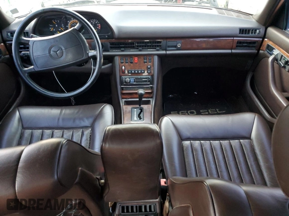 1986 Mercedes-Benz 560 with VIN WDBCA39DXGA239219, listed as a Copart auction lot 82033964 with 181,031 mi miles and Clean Title. Bid and sale history available at DreamBid. Image 8.