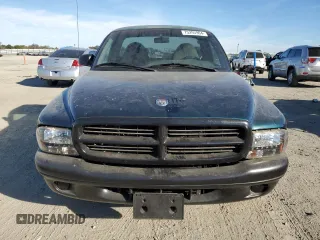 1998 Dodge Dakota SLT z VIN 1B7FL26XXWS656706, wystawiony jako Copart lot #75295904 z przebiegiem 89 796 mil mil oraz Szkoda całkowita • Salvage title. Historia ofert i sprzedaży dostępna na DreamBid. Obrazek 5.