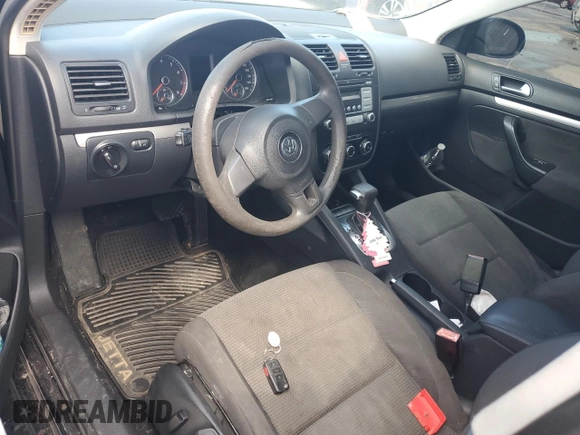 2010 Volkswagen Jetta S with VIN 3VWJZ7AJ3AM029692, listed as a Copart auction lot 61743435 with Not provided miles and Salvage title. Bid and sale history available at DreamBid. Image 8.