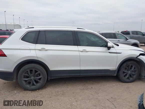 2023 Volkswagen Tiguan SE with VIN 3VVNB7AX8PM099759, listed as a IAAI auction lot 41340885 with 28,562 mi miles and . Bid and sale history available at DreamBid. Image 13.
