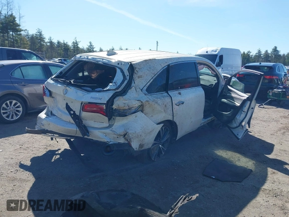 2019 Acura MDX Technology z VIN 5J8YD4H58KL020708, wystawiony jako IAAI lot #42047281 z przebiegiem 101 084 mil mil oraz . Historia ofert i sprzedaży dostępna na DreamBid. Obrazek 4.
