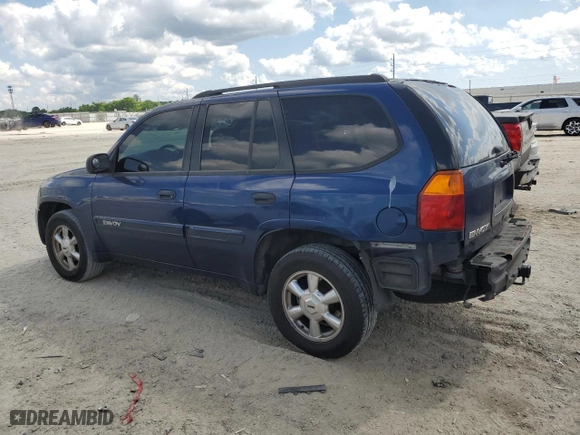 2004 GMC Envoy SLE with VIN 1GKDS13S342428948, listed as a Copart auction lot 52488385 with 292,426 mi miles and Salvage Title. Bid and sale history available at carsss.com. Image 2.