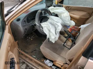 1997 Ford Escort LX with VIN 3FALP15P7VR132710, listed as a Copart auction lot 87546515 with 185,646 mi miles and Salvage Title. Bid and sale history available at carsss.com. Image 8.