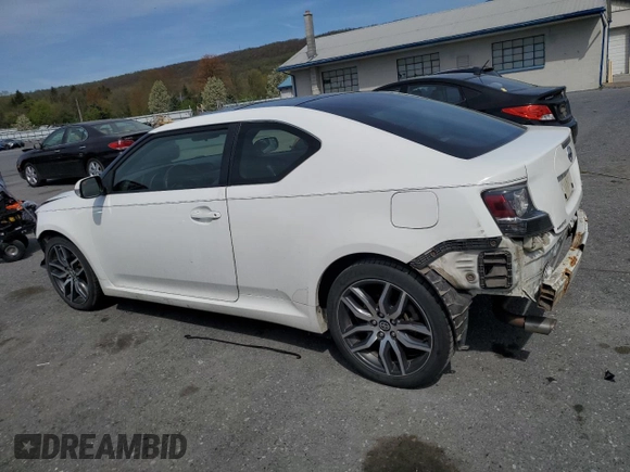 2014 Scion tC z VIN JTKJF5C70E3084697, wystawiony jako Copart lot #54307295 z przebiegiem 174 073 mil mil oraz Szkoda całkowita • Salvage title. Historia ofert i sprzedaży dostępna na DreamBid. Obrazek 2.