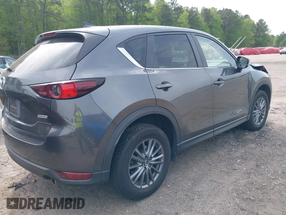 2017 Mazda CX-5 Touring z VIN JM3KFBCL4H0178747, wystawiony jako IAAI lot #42041380 z przebiegiem 112 083 mil mil oraz . Historia ofert i sprzedaży dostępna na DreamBid. Obrazek 4.