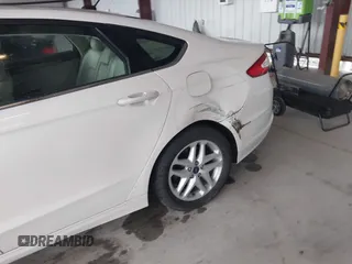 2016 Ford Fusion SE with VIN 1FA6P0HD3G5133027, listed as a IAAI auction lot 41843634 with 112,896 mi miles. Bid and sale history available at carsss.com. Image 6.