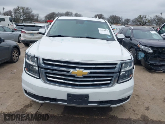 2017 Chevrolet Tahoe LT with VIN 1GNSKBKC1HR401044, listed as a IAAI auction lot 41573362 with 103,865 mi miles and . Bid and sale history available at DreamBid. Image 12.