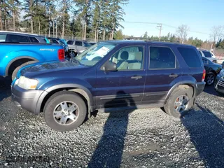 2004 Ford Escape XLT with VIN 1FMYU03134KA30806, listed as a IAAI auction lot 41449933 with 137,897 mi miles. Bid and sale history available at carsss.com. Image 14.