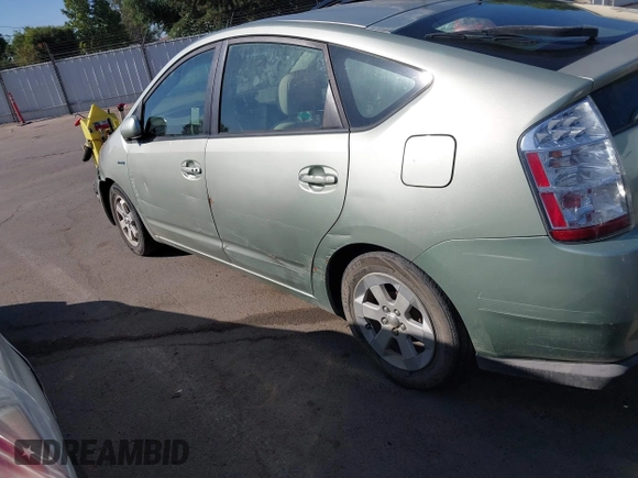 2007 Toyota Prius z VIN JTDKB20U973221624, wystawiony jako IAAI lot #42484947 z przebiegiem 257 311 mil mil oraz . Historia ofert i sprzedaży dostępna na DreamBid. Obrazek 13.