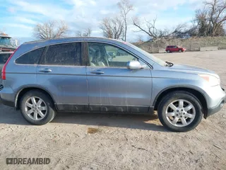 2009 Honda CR-V EX-L with VIN 5J6RE48749L028732, listed as a IAAI auction lot 41884092 with 164,402 mi miles. Bid and sale history available at carsss.com. Image 13.
