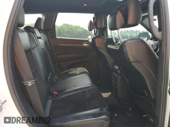 2018 Jeep Grand Cherokee Altitude with VIN 1C4RJFAGXJC122688, listed as a Copart auction lot 61290525 with 106,671 mi miles and Salvage title. Bid and sale history available at DreamBid. Image 11.