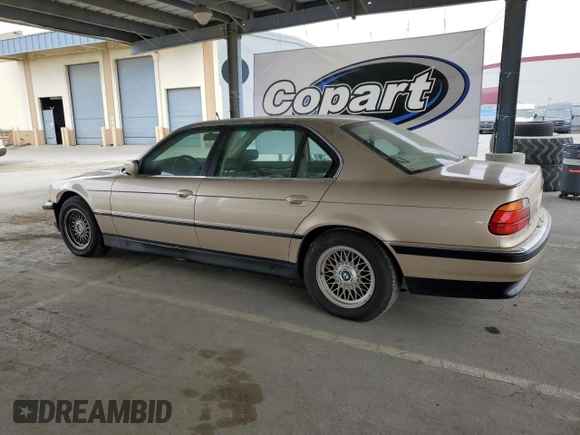 1998 BMW 7 Series 740il with VIN WBAGJ832XWDM11394, listed as a Copart auction lot 54390685 with 126,828 mi miles and Clean Title. Bid and sale history available at carsss.com. Image 2.