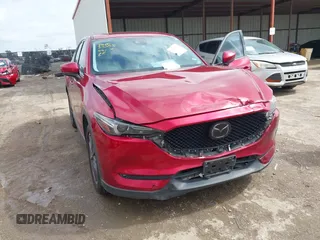 2018 Mazda CX-5 Grand Touring with VIN JM3KFADM7J1357401, listed as a IAAI auction lot 42106012 with 119,420 mi miles and . Bid and sale history available at DreamBid. Image 6.
