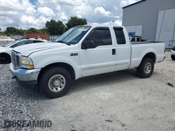 2003 Ford F-250 XL with VIN 1FTNX20L63EB37975, listed as a Copart auction lot 65723935 with 157,377 mi miles and Salvage title. Bid and sale history available at DreamBid. Image 1.