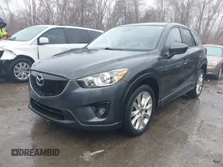 2014 Mazda CX-5 Grand Touring with VIN JM3KE4DY0E0392476, listed as a IAAI auction lot 41419144 with 89,245 mi miles and . Bid and sale history available at carsss.com. Image 17.