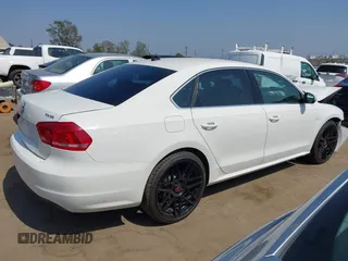 2014 Volkswagen Passat SE z VIN 1VWBN7A3XEC068708, wystawiony jako IAAI lot #42439517 z przebiegiem 144 563 mil mil oraz . Historia ofert i sprzedaży dostępna na DreamBid. Obrazek 14.