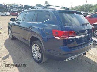 2020 Volkswagen Atlas SE z VIN 1V2WR2CA8LC503891, wystawiony jako IAAI lot #42350826 z przebiegiem 88 306 mil mil oraz . Historia ofert i sprzedaży dostępna na DreamBid. Obrazek 3.