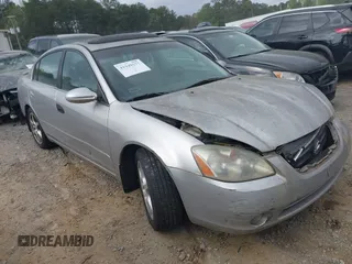 2002 Nissan Altima SE with VIN 1N4BL11D22C276694, listed as a IAAI auction lot 41949577 with 170,000 mi miles. Bid and sale history available at carsss.com. Image 1.