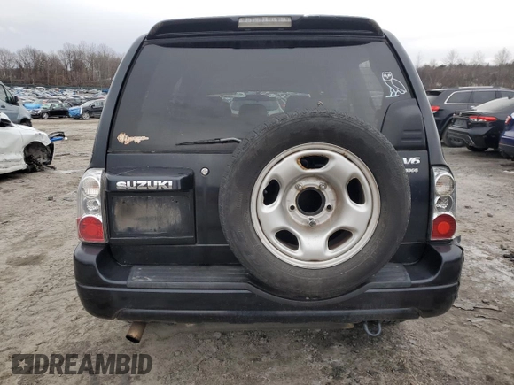 2004 Suzuki XL7 LX z VIN JS3TX92V344110661, wystawiony jako Copart lot #43613315 z przebiegiem 143 334 mil mil oraz Szkoda całkowita • Salvage title. Historia ofert i sprzedaży dostępna na DreamBid. Obrazek 6.