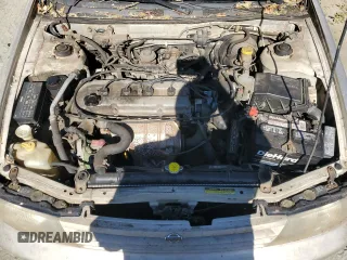 1996 Nissan Altima XE z VIN 1N4BU31D5TC104895, wystawiony jako Copart lot #77043684 z przebiegiem 133 113 mil mil oraz Szkoda całkowita • Salvage title. Historia ofert i sprzedaży dostępna na DreamBid. Obrazek 11.