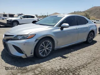 2018 Toyota Camry LE с VIN 4T1B11HKXJU647206, выставлен на аукционе Copart как лот 57107825 с пробегом 137 161 миль миль и Списание • Salvage title. История ставок и продаж доступна на DreamBid. Изображение 1.