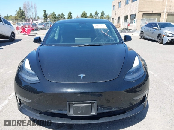 2021 Tesla Model 3 Long Range with VIN 5YJ3E1EB4MF064631, listed as a IAAI auction lot 41424856 with 95,511 mi miles and . Bid and sale history available at DreamBid. Image 12.