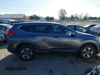 2019 Honda CR-V LX z VIN 2HKRW6H39KH219441, wystawiony jako IAAI lot #41912978 z przebiegiem 99 828 mil mil oraz . Historia ofert i sprzedaży dostępna na DreamBid. Obrazek 13.