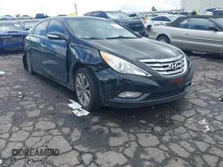 2013 Hyundai Sonata SE z VIN 5NPEC4AB6DH671007, wystawiony jako IAAI lot #42372573 z przebiegiem 149 030 mil mil oraz . Historia ofert i sprzedaży dostępna na DreamBid. Obrazek 1.