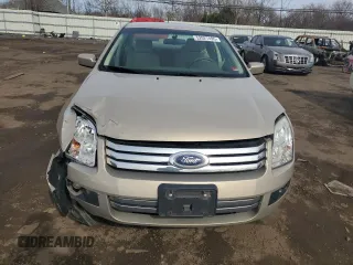 2007 Ford Fusion SE with VIN 3FAHP01107R141043, listed as a Copart auction lot 52027495 with 101,170 mi miles and Salvage Title. Bid and sale history available at carsss.com. Image 5.