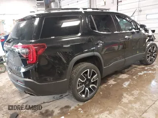 2021 GMC Acadia SLE with VIN 1GKKNRL48MZ205827, listed as a IAAI auction lot 41128487 with 52,324 mi miles and . Bid and sale history available at DreamBid. Image 4.