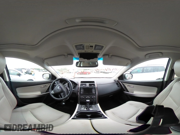 2015 Mazda CX-9 Grand Touring with VIN JM3TB2DA6F0460785, listed as a IAAI auction lot 42474705 with 62,202 mi miles and . Bid and sale history available at DreamBid. Image 18.