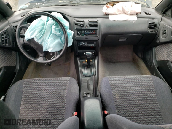 1998 Subaru Legacy Outback with VIN 4S3BG6850W7601142, listed as a Copart auction lot 57319505 with 227,489 mi miles and Salvage title. Bid and sale history available at DreamBid. Image 8.