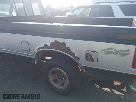 1996 Ford F-150 with VIN 1FTEX14H0TKA49456, listed as a IAAI auction lot 42689128 with 243,331 mi miles and . Bid and sale history available at DreamBid. Image 14.