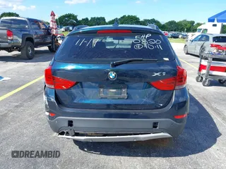 2015 BMW X1 xDrive28i z VIN WBAVL1C57FVY30820, wystawiony jako IAAI lot #40693352 z przebiegiem 111 221 mil mil oraz . Historia ofert i sprzedaży dostępna na DreamBid. Obrazek 15.