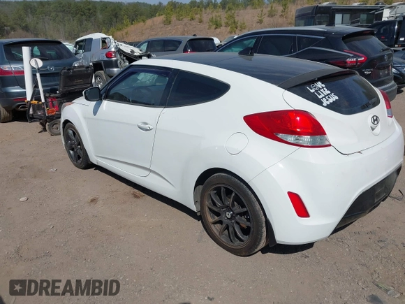 2014 Hyundai Veloster with VIN KMHTC6AD1EU217707, listed as a IAAI auction lot 41718176 with 191,306 mi miles. Bid and sale history available at carsss.com. Image 3.