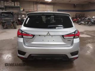 2021 Mitsubishi Outlander ES z VIN JA4APUAU0MU030598, wystawiony jako IAAI lot #40512460 z przebiegiem 52 666 mil mil oraz . Historia ofert i sprzedaży dostępna na DreamBid. Obrazek 16.