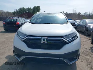 2020 Honda CR-V Touring z VIN 2HKRW2H9XLH623380, wystawiony jako IAAI lot #42039028 z przebiegiem 59 795 mil mil oraz . Historia ofert i sprzedaży dostępna na DreamBid. Obrazek 12.