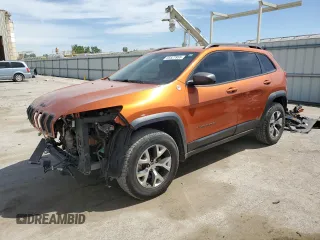 2015 Jeep Cherokee Trailhawk with VIN 1C4PJMBS5FW523019, listed as a Copart auction lot 55527955 with 107,503 mi miles and Salvage title. Bid and sale history available at DreamBid. Image 1.