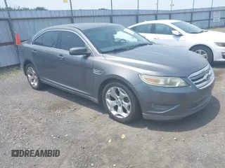 2011 Ford Taurus SEL z VIN 1FAHP2HW3BG147870, wystawiony jako IAAI lot #42467996 z przebiegiem 124 220 mil mil oraz . Historia ofert i sprzedaży dostępna na DreamBid. Obrazek 1.