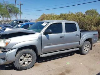 2015 Toyota Tacoma with VIN 3TMLU4EN6FM188736, listed as a IAAI auction lot 42605859 with 210,717 mi miles and . Bid and sale history available at DreamBid. Image 15.