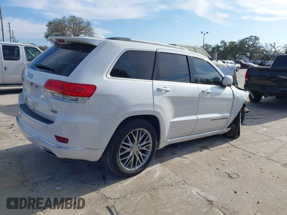 2018 Jeep Grand Cherokee Summit with VIN 1C4RJEJG3JC394624, listed as a IAAI auction lot 41412939 with 80,180 mi miles and . Bid and sale history available at DreamBid. Image 4.