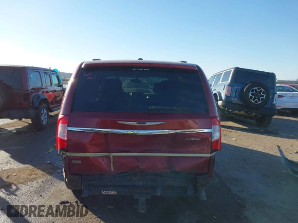 2013 Chrysler Town & Country Touring with VIN 2C4RC1BG2DR758951, listed as a IAAI auction lot 41136184 with 134,784 mi miles. Bid and sale history available at carsss.com. Image 16.