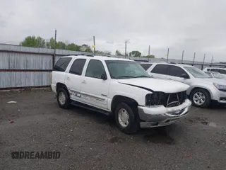 2003 GMC Yukon SLT with VIN 1GKEC13Z13J197955, listed as a IAAI auction lot 41953835 with 208,752 mi miles. Bid and sale history available at carsss.com. Image 1.