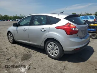 2012 Ford Focus SE z VIN 1FAHP3K2XCL270196, wystawiony jako Copart lot #57319575 z przebiegiem 80 364 mil mil oraz Szkoda całkowita • Salvage title. Historia ofert i sprzedaży dostępna na DreamBid. Obrazek 2.