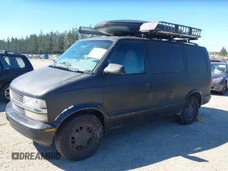 2000 Chevrolet Astro with VIN 1GNEL19W5YB216735, listed as a IAAI auction lot 42064306 with 243,191 mi miles. Bid and sale history available at carsss.com. Image 2.