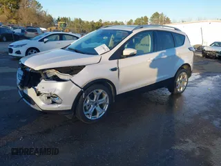 2017 Ford Escape Titanium with VIN 1FMCU0J98HUA75690, listed as a IAAI auction lot 41358534 with 90,376 mi miles. Bid and sale history available at carsss.com. Image 2.
