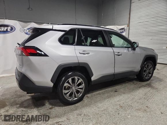 2022 Toyota RAV4 Hybrid XLE Premium with VIN 4T3B6RFV1NU080099, listed as a Copart auction lot 60206905 with 59,859 mi miles and Clean title. Bid and sale history available at DreamBid. Image 3.