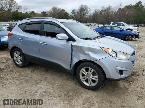 2011 Hyundai Tucson Limited with VIN KM8JUCAC8BU196358, listed as a Copart auction lot 51111975 with 200,439 mi miles and Salvage Title. Bid and sale history available at DreamBid. Image 4.