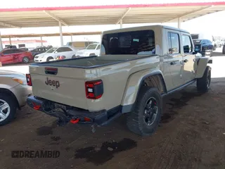 2022 Jeep Gladiator Rubicon with VIN 1C6JJTBG2NL164117, listed as a IAAI auction lot 42450350 with 22,326 mi miles and . Bid and sale history available at DreamBid. Image 4.