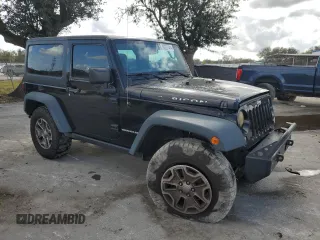 2016 Jeep Wrangler Rubicon with VIN 1C4BJWCG3GL162649, listed as a Copart auction lot 86327414 with 131,407 mi miles and Salvage title. Bid and sale history available at DreamBid. Image 4.